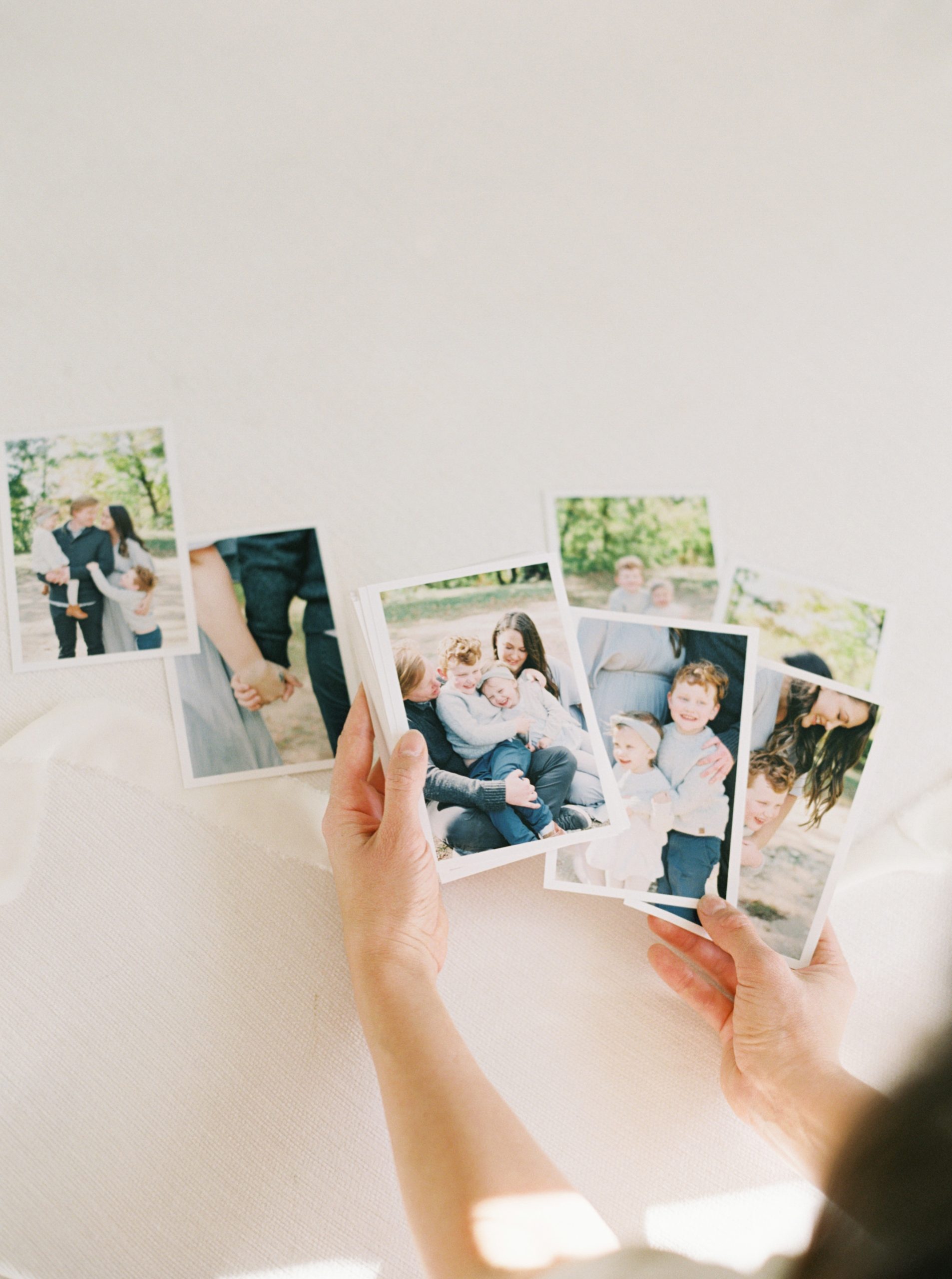 milwaukee family photographer displays a collecgtion of prints from a family photo session
