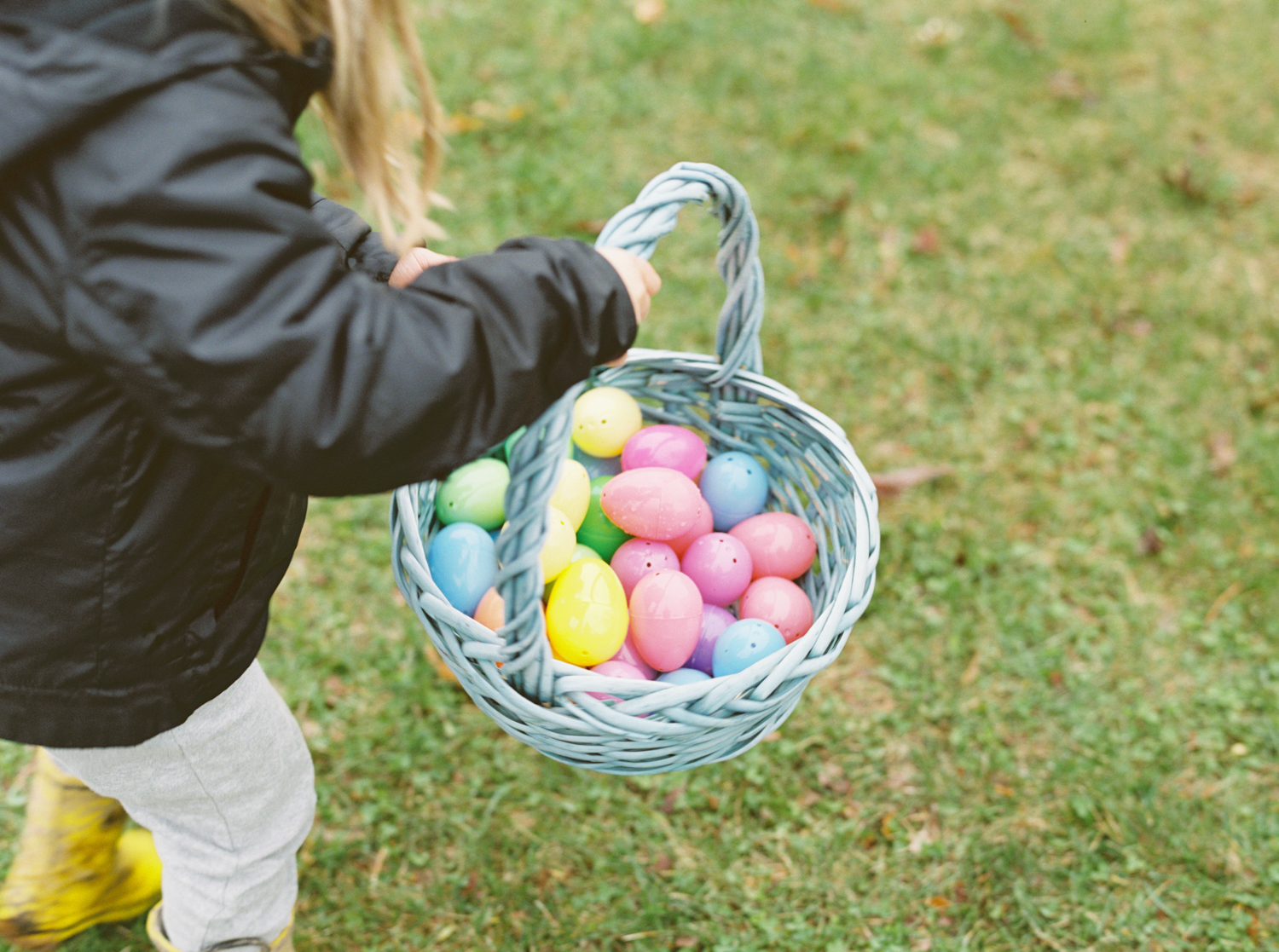easter basket full of colorful easter eggs